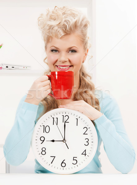 Atraente empresária relógio vermelho copo quadro Foto stock © dolgachov