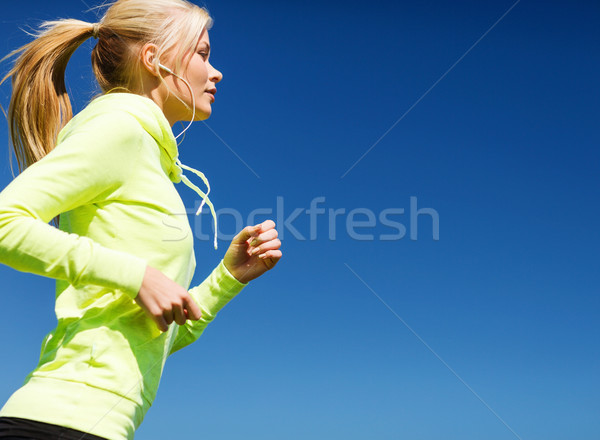 woman doing running outdoors Stock photo © dolgachov