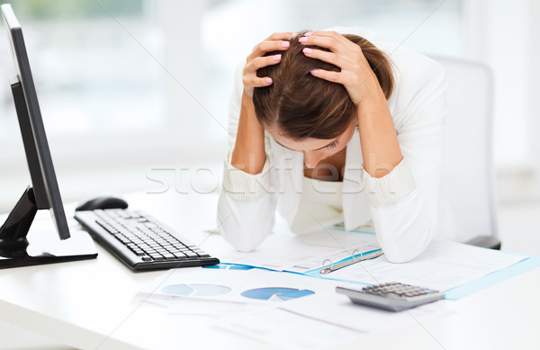 Equipo mujer documentos calculadora negocios oficina Foto stock © dolgachov