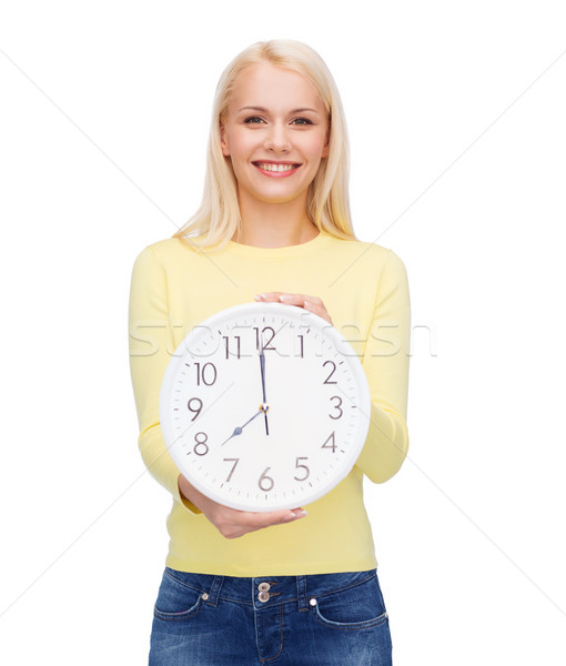 student with wall clock Stock photo © dolgachov