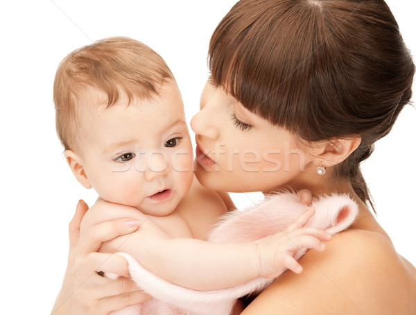 happy mother kissing baby Stock photo © dolgachov