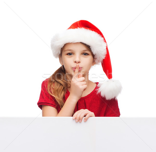 child in santa helper hat with blank white board Stock photo © dolgachov