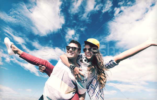 teenagers having fun outside Stock photo © dolgachov