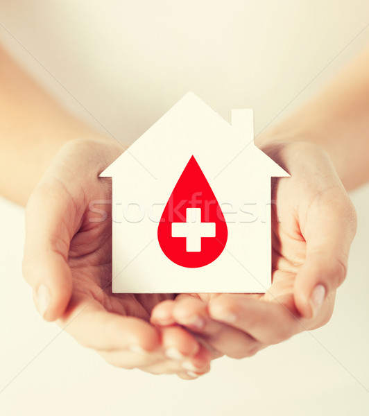 Mâini casă donator semna asistenţă medicală Imagine de stoc © dolgachov