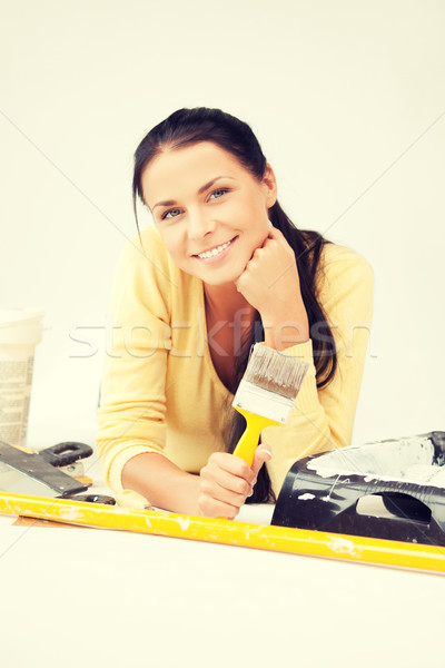 Stock photo: lovely housewife painting