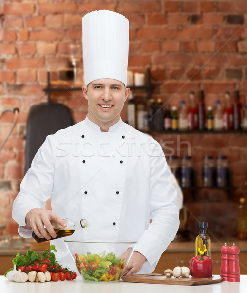 Szczęśliwy mężczyzna kucharz gotować gotowania żywności Zdjęcia stock © dolgachov