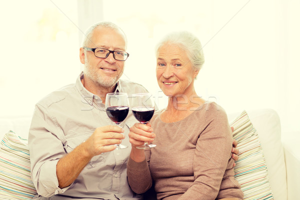 happy senior couple with glasses of red wine Stock photo © dolgachov