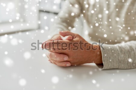 close up of happy male gay couple holding hands Stock photo © dolgachov