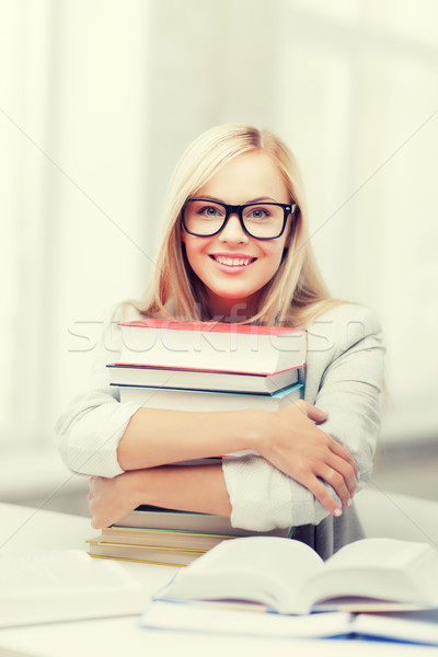 Student książek zdjęcie uśmiechnięty dziewczyna Zdjęcia stock © dolgachov