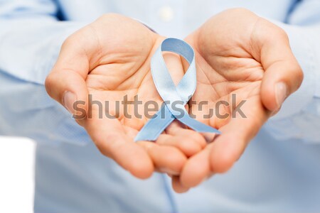 close up of happy male gay couple with love symbol Stock photo © dolgachov