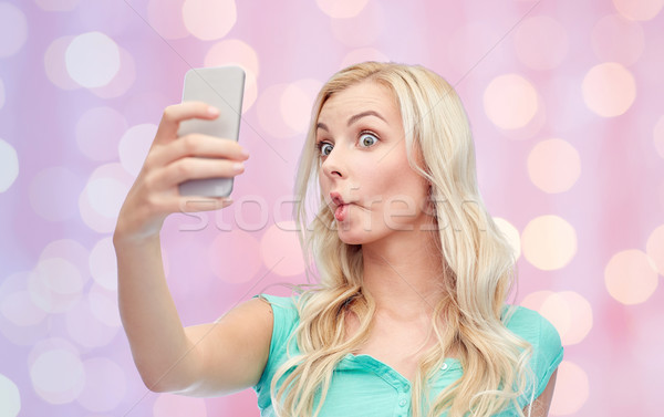 Stockfoto: Grappig · jonge · vrouw · smartphone · uitdrukkingen · technologie