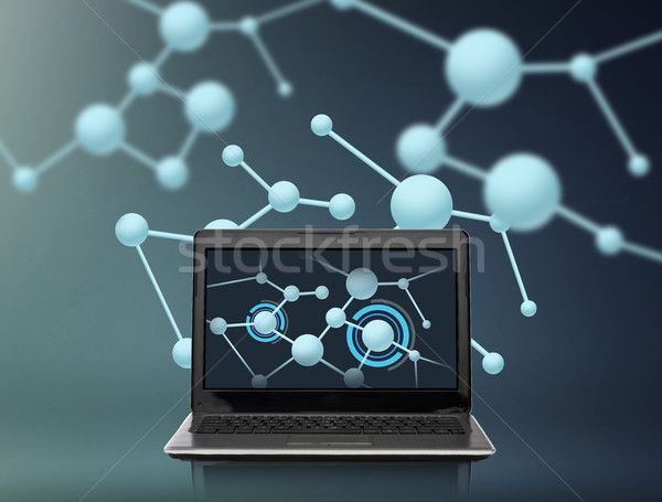 Stock photo: laptop computer with molecules structure on screen