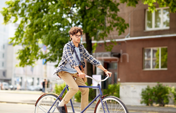 年輕 時髦 男子 袋 騎術 固定 商業照片 © dolgachov