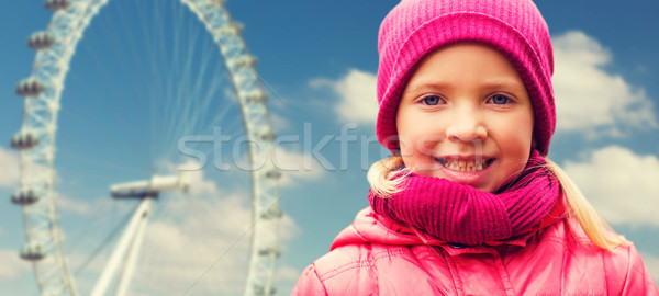 happy little girl portrait over ferry wheel Stock photo © dolgachov