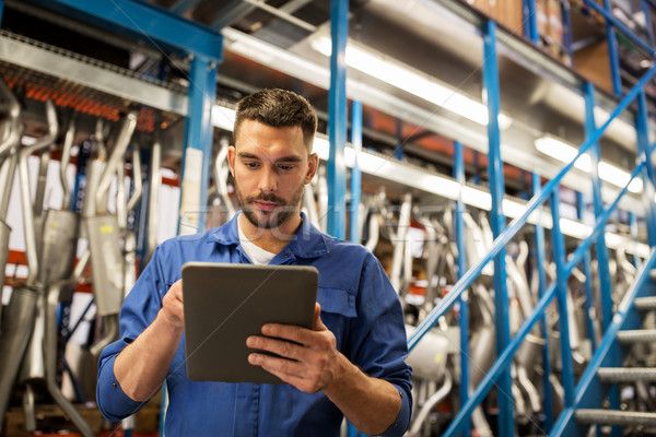 auto mechanic or smith with tablet pc at workshop Stock photo © dolgachov