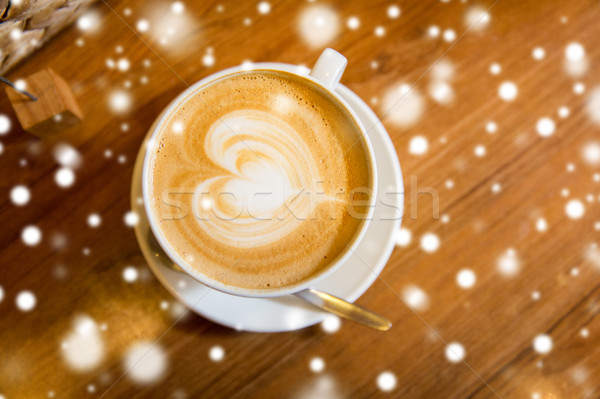 close up of coffee cup with heart shape drawing Stock photo © dolgachov