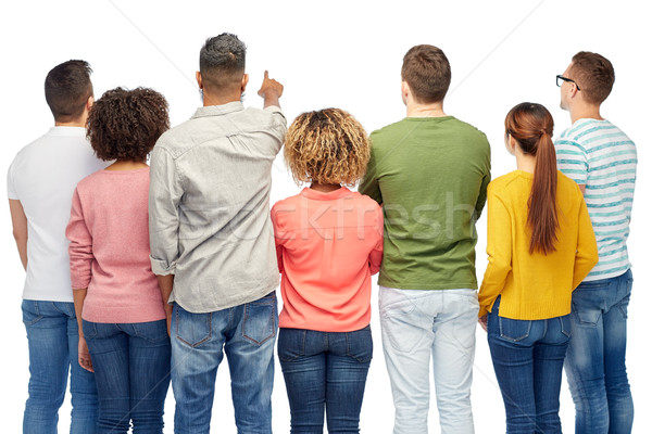 Grupo de personas senalando algo diversidad carrera Foto stock © dolgachov