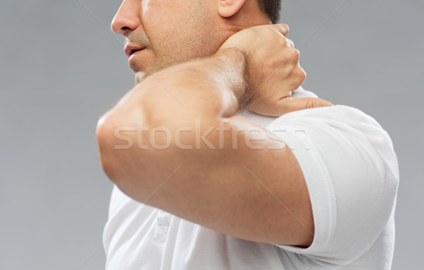 Hombre sufrimiento dolor de cuello personas salud Foto stock © dolgachov