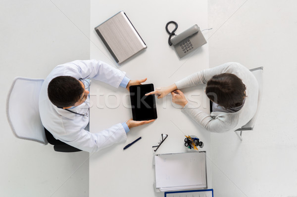 doctor and young woman meeting at hospital Stock photo © dolgachov