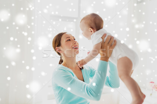 Feliz jóvenes madre pequeño bebé casa Foto stock © dolgachov