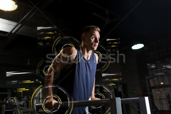 Adam üç başlı kas paralel çubuklar spor salonu Stok fotoğraf © dolgachov