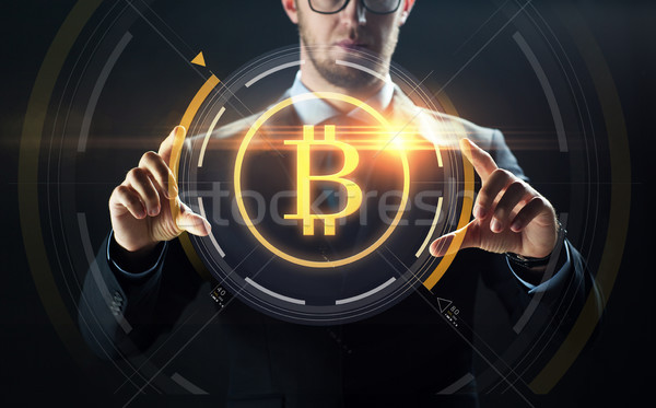 Zakenman bitcoin hologram financieren business Stockfoto © dolgachov