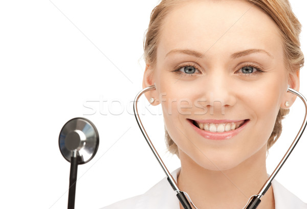 Привлекательная женщина врач стетоскоп фотография женщину девушки Сток-фото © dolgachov