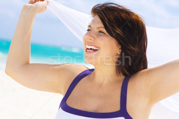 happy woman with white sarong Stock photo © dolgachov