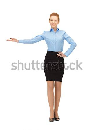 smiling stewardess showing direction Stock photo © dolgachov