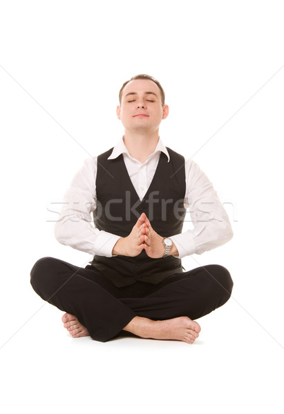 businessman sitting in lotus pose Stock photo © dolgachov