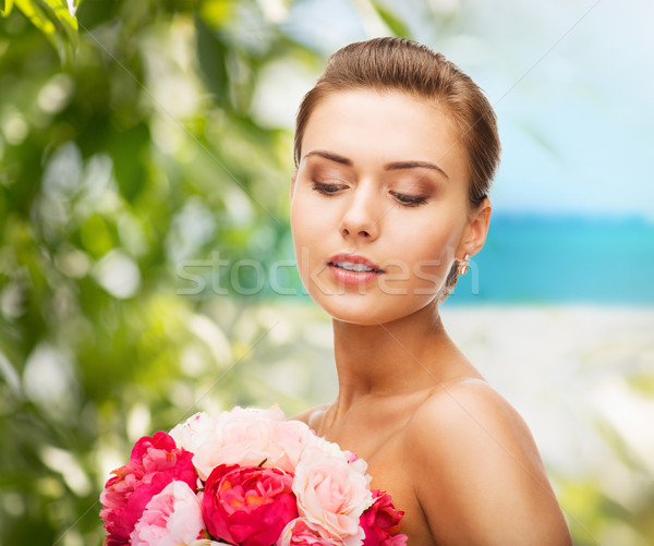 Mujer pendientes flores belleza Foto stock © dolgachov