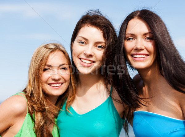 girls walking on the beach Stock photo © dolgachov