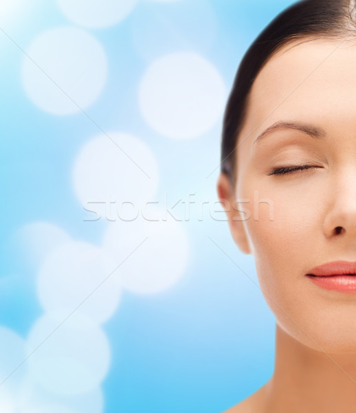relaxed young woman with closed eyes Stock photo © dolgachov