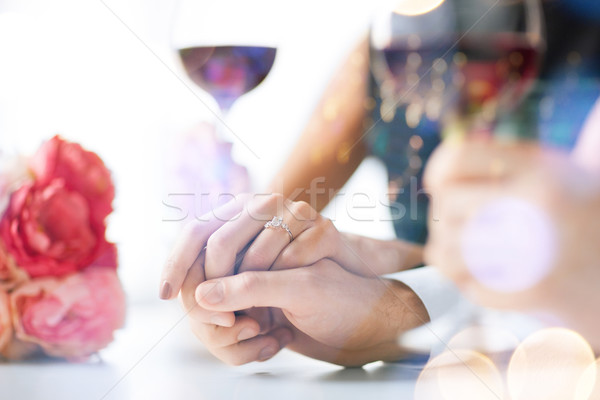 engaged couple with wine glasses Stock photo © dolgachov