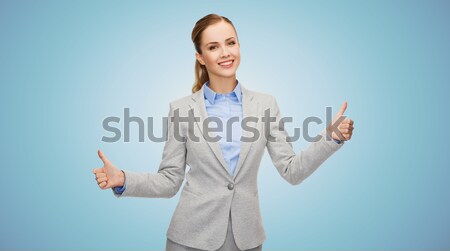 Sonriendo mujer de negocios negocios gesto Foto stock © dolgachov