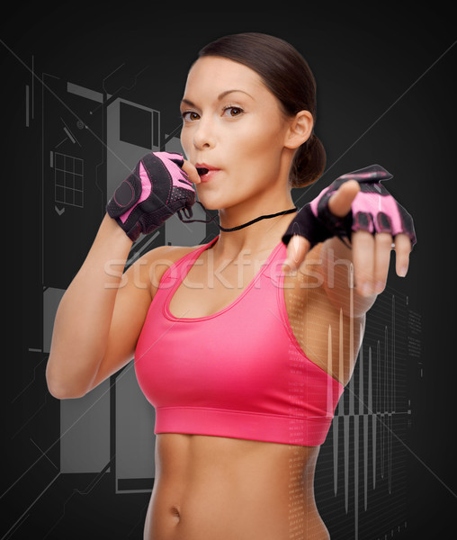 asian personal trainer with whistle Stock photo © dolgachov