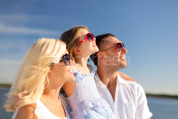 happy family with blue sky Stock photo © dolgachov