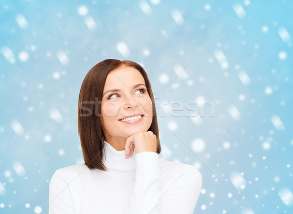 4828401_stock-photo-thinking-and-smiling-woman-in-white-sweater.jpg