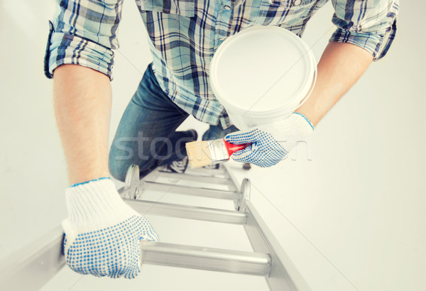 man with paintbrush and pot Stock photo © dolgachov