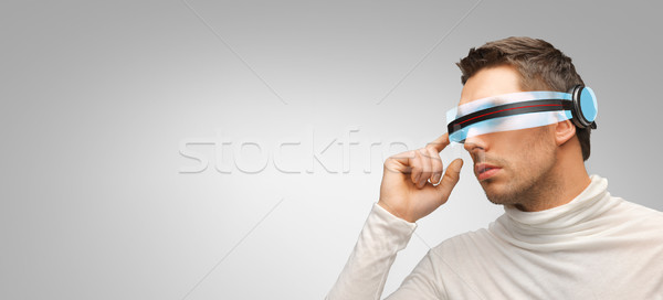 Hombre futurista gafas 3d personas tecnología futuro Foto stock © dolgachov