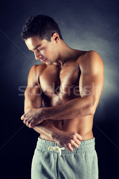 young male bodybuilder Stock photo © dolgachov