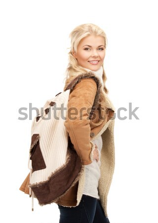beautiful woman in sheepskin jacket Stock photo © dolgachov