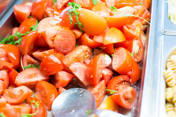 close up of tomato salad in container Stock photo © dolgachov