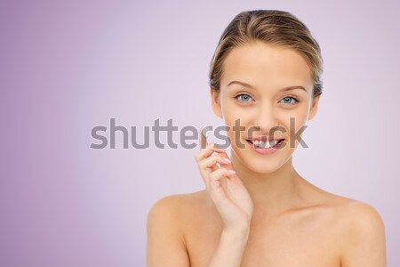 Feliz mulher jovem creme cara beleza Foto stock © dolgachov