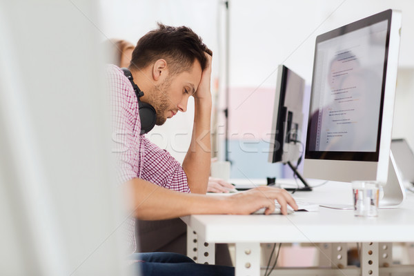 stressed software developer at office Stock photo © dolgachov