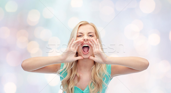 angry young woman or teenage girl shouting Stock photo © dolgachov