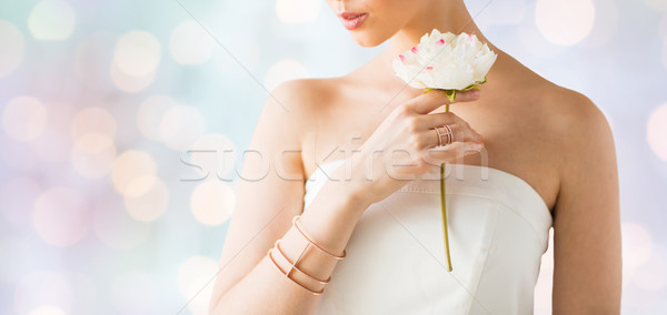 close up of beautiful woman with ring and bracelet Stock photo © dolgachov
