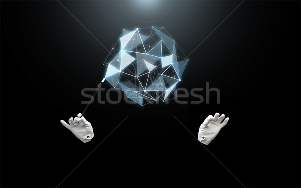 magician hands with magic wand showing trick Stock photo © dolgachov