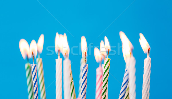 Bougies d'anniversaire brûlant bleu vacances célébration fête [[stock_photo]] © dolgachov