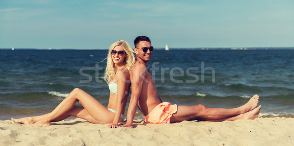 Glücklich Paar Badebekleidung Sitzung Sommer Strand Stock foto © dolgachov